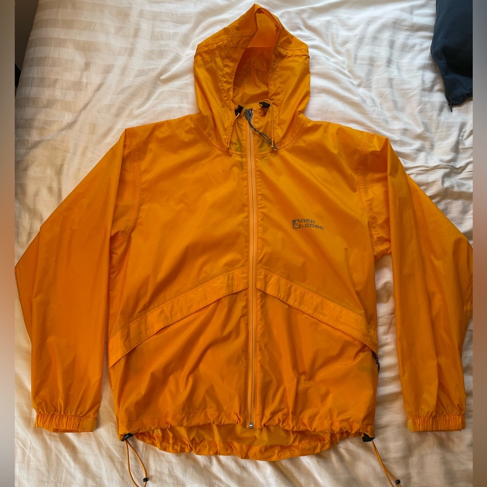 Red Ledge Windbreaker Raincoat. Size small (runs big) in yellow